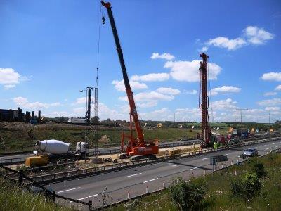 Cranes and vehicles on a highways projects